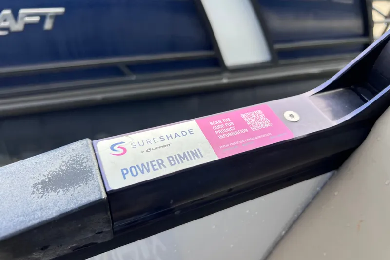 Slide: The Image of 2024 Starcraft SLS 3 SureShade Power Bimini with QR code for product information. - 11