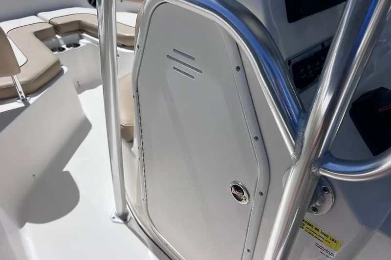 Slide: The Image of 2016 Key West 203 FS boat interior with seating and stainless steel railings. - 34