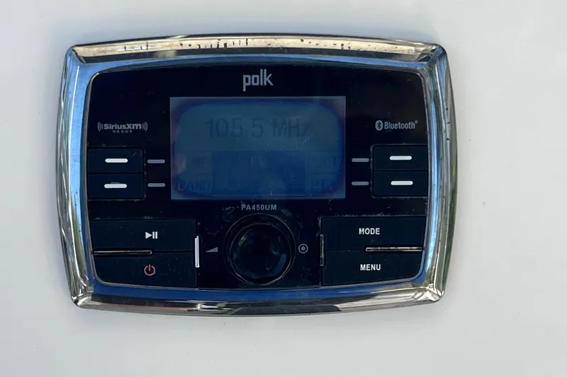 Slide: The Image of Polk audio system on 2016 Key West 203 FS boat, displaying 105.5 MHz frequency. - 29