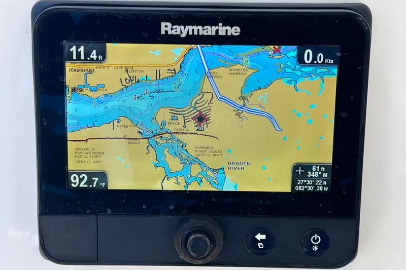 Slide: The Image of Raymarine GPS display on 2016 Key West 203 FS boat, showing navigation map and data. - 27