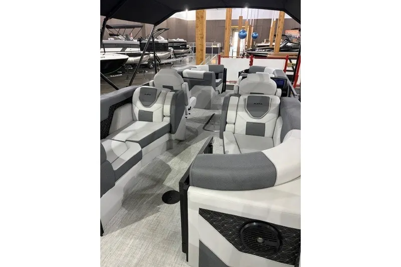 Slide: The Image of Interior of 2027 Alera M21Q boat with modern seating and sleek design. - 14