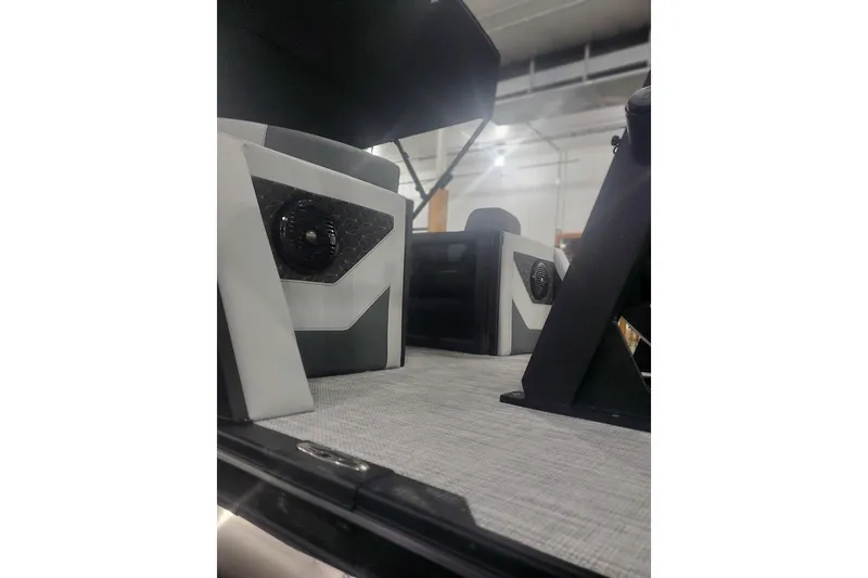 Slide: The Image of Modern Alera M21Q 2027 boat interior with sleek speaker design and stylish seating. - 8