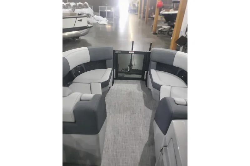 Slide: The Image of Interior of 2027 Alera M21Q boat with gray seating and modern design. - 11