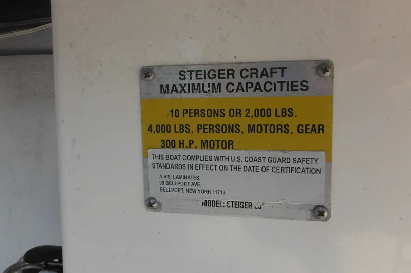 Slide: The Image of Steiger Craft 255 Miami 2020 capacity plate detailing weight and passenger limits. - 57