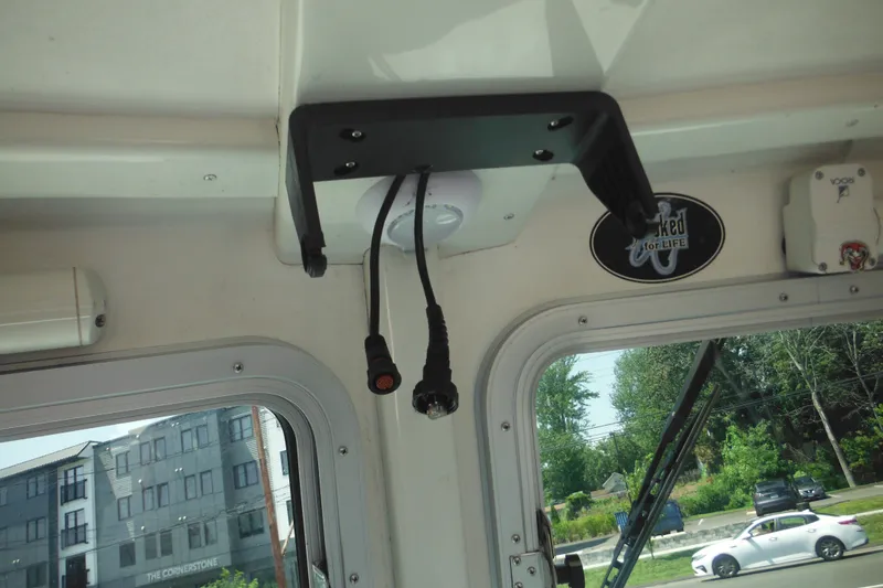Slide: The Image of Interior view of a 2020 Steiger Craft 255 Miami boat, showing ceiling-mounted cables. - 56