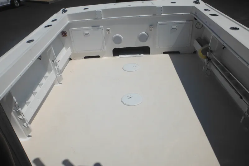 Slide: The Image of 2020 Steiger Craft 255 Miami boat deck, featuring spacious layout and storage compartments. - 41
