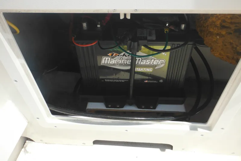 Slide: The Image of Marine battery compartment in a 2020 Steiger Craft 255 Miami boat. - 44