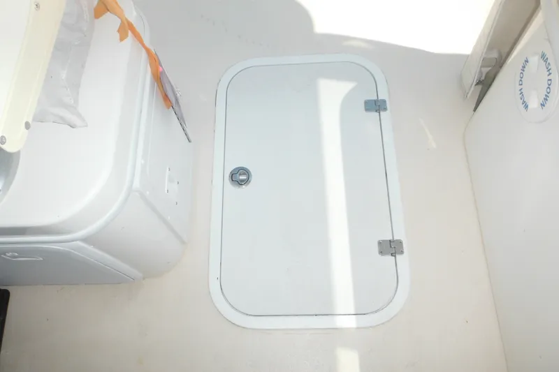 Slide: The Image of 2020 Steiger Craft 255 Miami boat interior with hatch and storage compartment. - 39