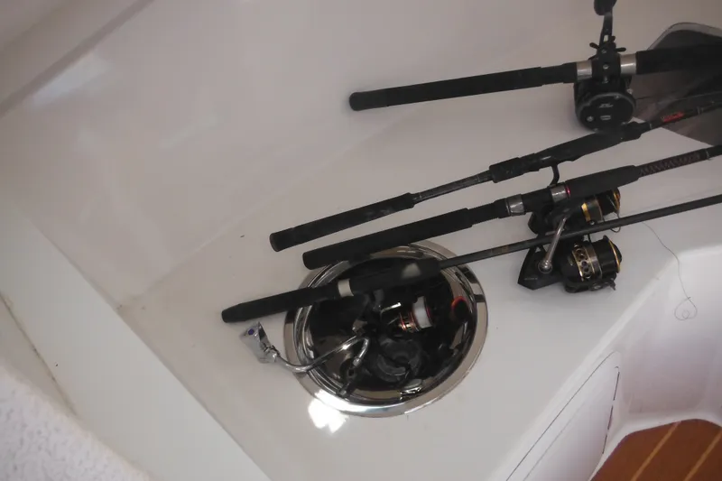 Slide: The Image of Fishing rods on a 2020 Steiger Craft 255 Miami boat deck. - 15