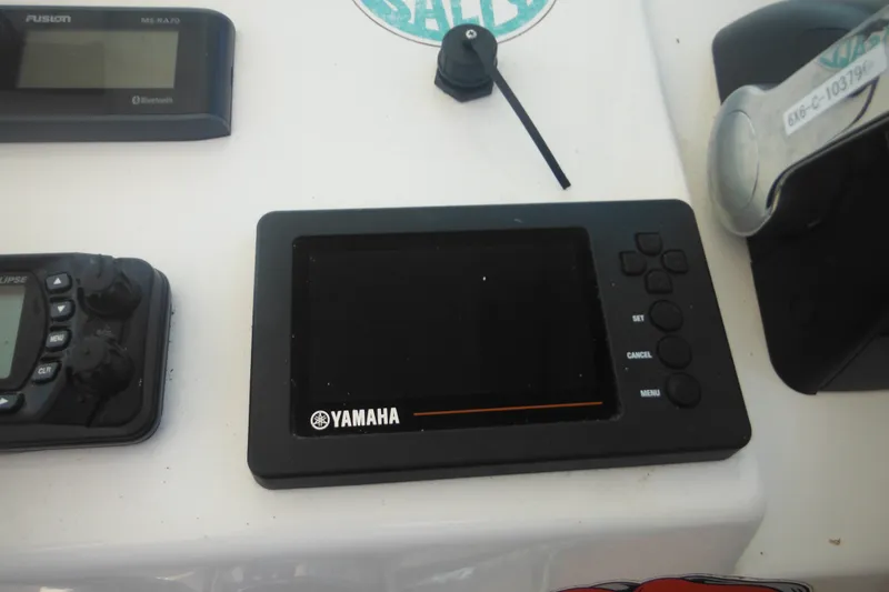 Slide: The Image of Yamaha control panel on 2020 Steiger Craft 255 Miami boat dashboard. - 52