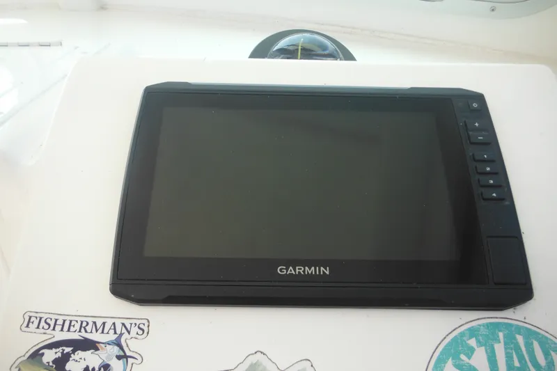Slide: The Image of Garmin navigation system on 2020 Steiger Craft 255 Miami boat dashboard. - 53