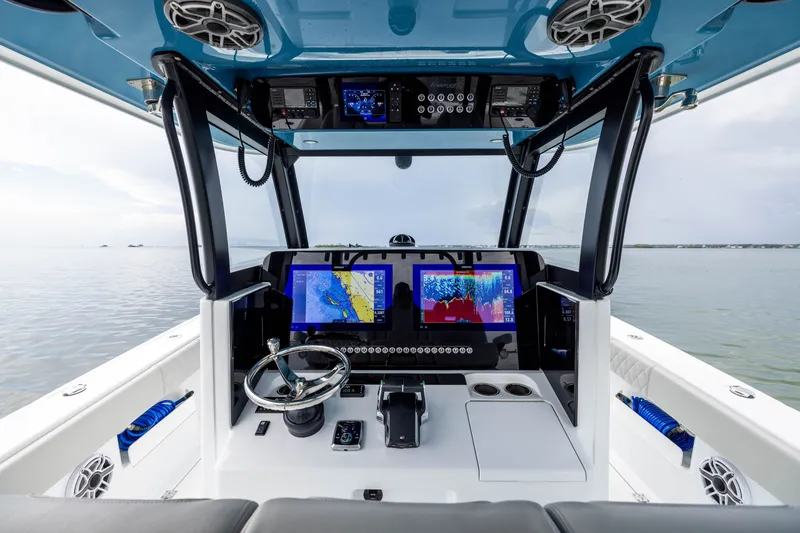 Slide: The Image of Freeman 35 boat cockpit with advanced navigation systems, 2025 model. - 30
