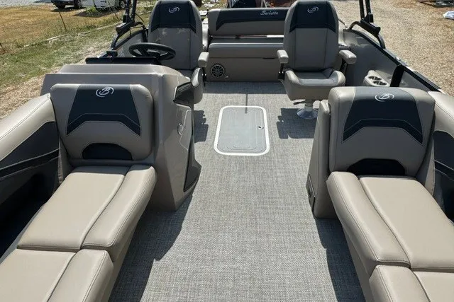 Slide: The Image of 2027 Barletta Aria 24UC pontoon boat interior with luxurious seating and modern design. - 12