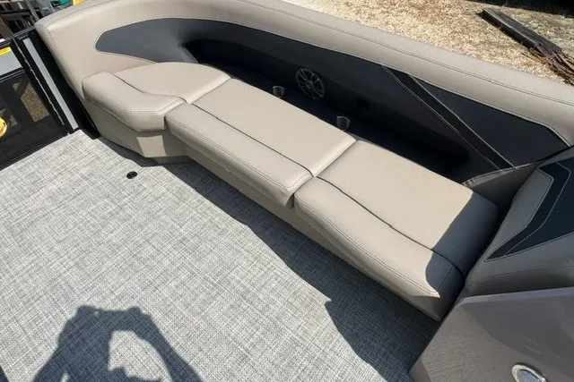 Slide: The Image of 2027 Barletta Aria 24UC boat interior with sleek beige seating and modern design. - 10