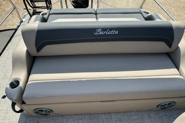 Slide: The Image of 2027 Barletta Aria 24UC boat seating with cup holders and speakers. - 18
