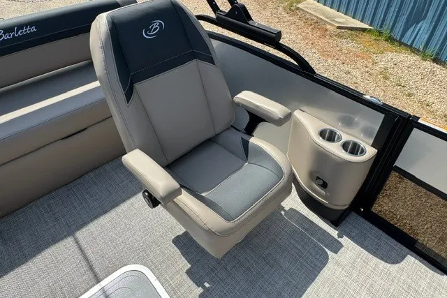 Slide: The Image of Captain's chair on 2027 Barletta Aria 24UC pontoon boat with cup holders. - 14