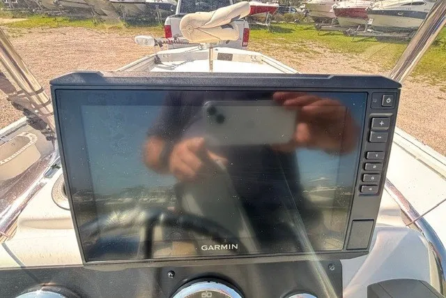 Slide: The Image of Garmin navigation system on 2019 G3 Bay 20 boat, reflecting surroundings. - 36