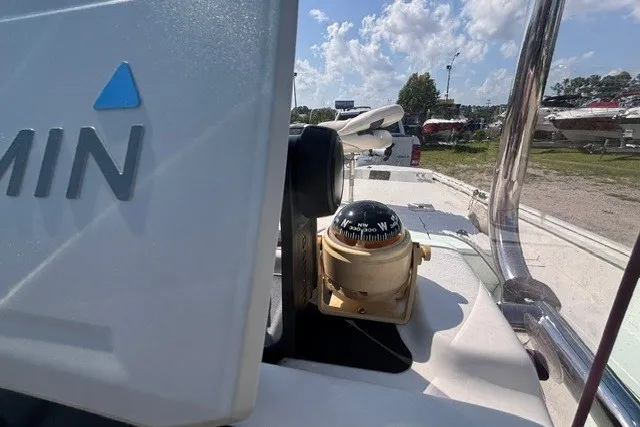 Slide: The Image of Boat dashboard with Garmin device and compass, G3 Bay 20, 2019 model. - 21