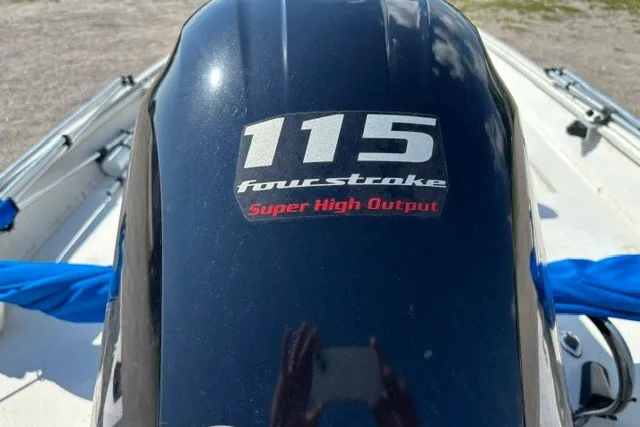 Slide: The Image of Outboard motor with "115 four stroke Super High Output" label on a 2019 G3 Bay 20 boat. - 28