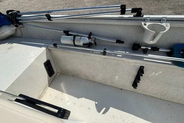 Slide: The Image of Boat interior with mounted fishing rod holders and fire extinguisher, G3 Bay 20, 2019 model. - 18