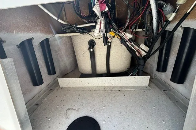 Slide: The Image of Interior view of a 2019 G3 Bay 20 boat showing wiring and compartments. - 16