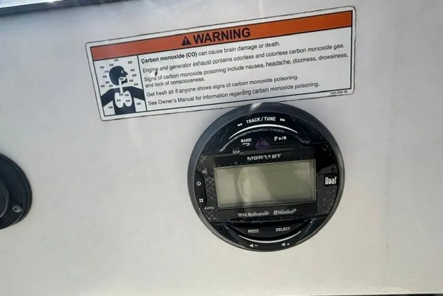 Slide: The Image of Control panel of a 2019 G3 Bay 20 boat with carbon monoxide warning label. - 17
