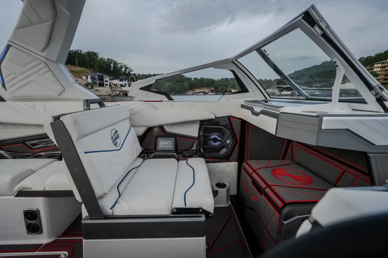 Slide: The Image of Interior of 2027 Tigé Ultré 25ZX boat with modern seating and sleek design. - 70
