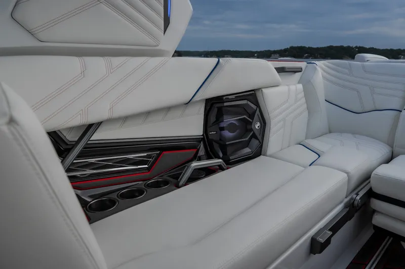 Slide: The Image of Luxurious interior of 2027 Tige Ultré 25ZX boat with sleek white seating and modern speaker system. - 31