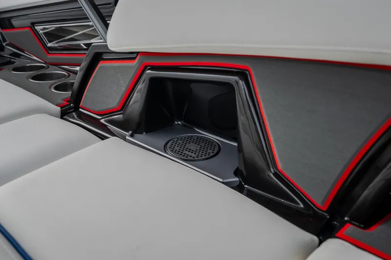 Slide: The Image of Interior of 2027 Tige Ultré 25ZX boat with sleek seating and cup holders. - 32