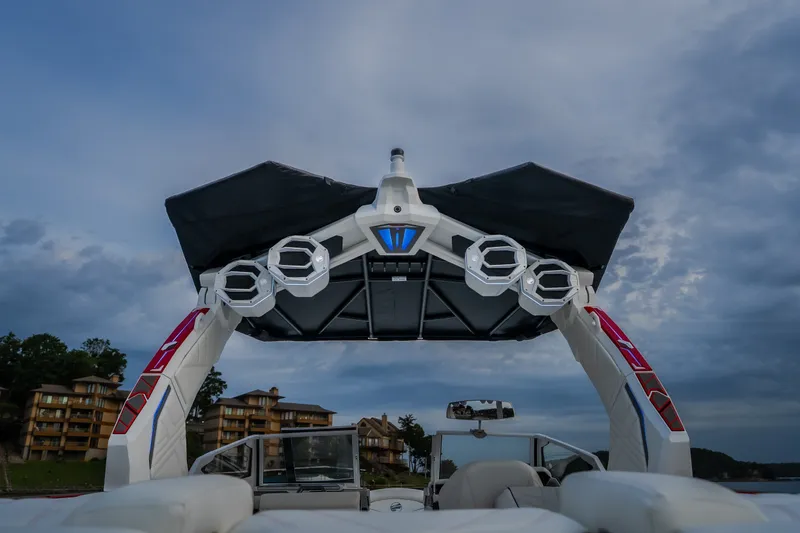 Slide: The Image of 2027 Tige Ultré 25ZX boat with advanced sound system and sleek design. - 40