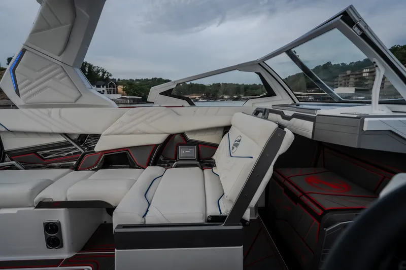 Slide: The Image of Interior of 2027 Tige Ultré 25ZX boat with modern seating and sleek design. - 19