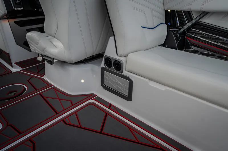 Slide: The Image of Interior of 2027 Tige Ultré 25ZX boat with sleek seating and modern design. - 28