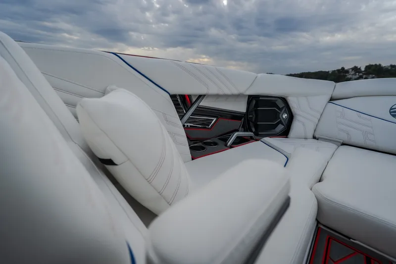 Slide: The Image of Luxurious interior of 2027 Tigé Ultré 25ZX boat with plush seating and modern design. - 59