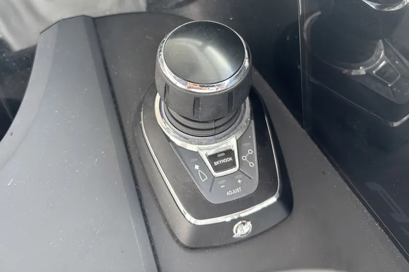 Slide: The Image of Control knob on 2023 Axopar 45 XC Cross Cabin boat dashboard. - 9