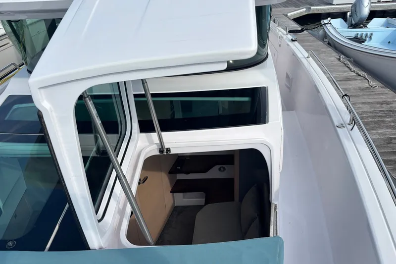 Slide: The Image of 2023 Axopar 45 XC Cross Cabin interior view with modern design elements. - 35