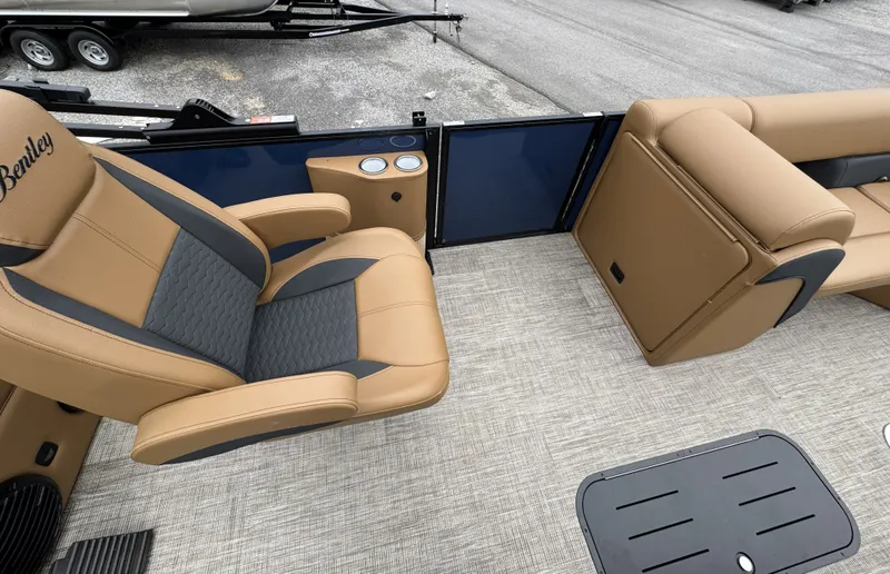 Slide: The Image of Luxurious seating area on a 2026 Bentley Pontoons Elite 223 SwingBack DC with comfortable leather seats. - 13