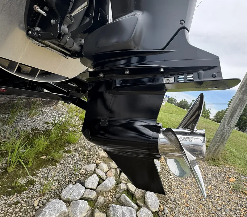 Slide: The Image of Close-up of a boat propeller on a gravel bed. - 3