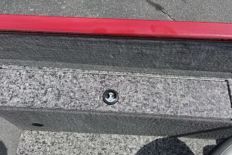 Slide: The Image of 2025 Tracker Pro Guide V-175 Combo boat interior with textured gray flooring and red trim. - 31