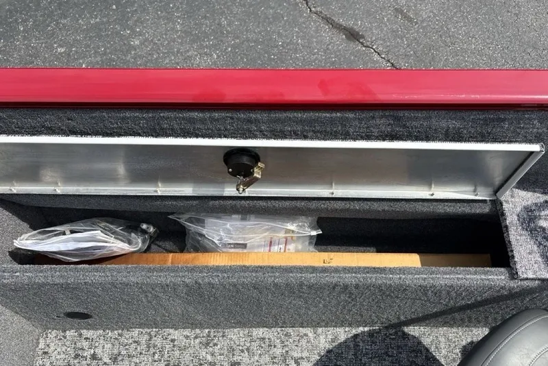 Slide: The Image of Storage compartment of 2025 Tracker Pro Guide V-175 Combo boat, featuring organized interior space. - 40