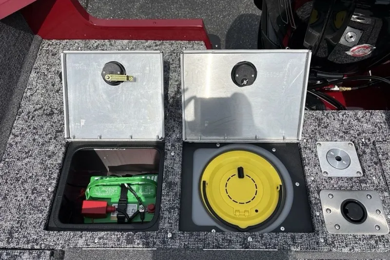Slide: The Image of 2025 Tracker Pro Guide V-175 Combo boat compartments with battery and storage. - 33