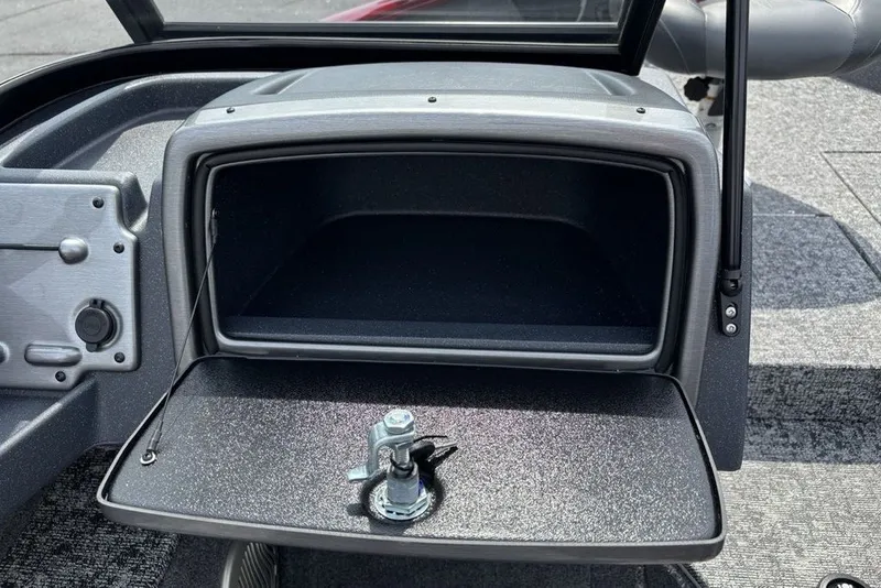 Slide: The Image of Open storage compartment in 2025 Tracker Pro Guide V-175 Combo boat. - 19