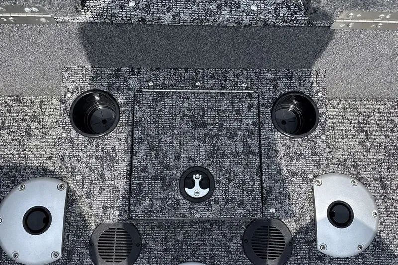 Slide: The Image of Interior view of 2025 Tracker Pro Guide V-175 Combo boat deck with cup holders. - 30
