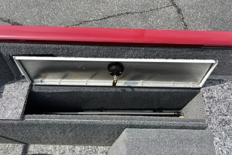 Slide: The Image of Open storage compartment in 2025 Tracker Pro Guide V-175 Combo boat. - 43