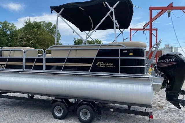 Slide: The Image of 2015 Bentley Pontoons 220 Cruise on trailer with Mercury outboard motor. - 3