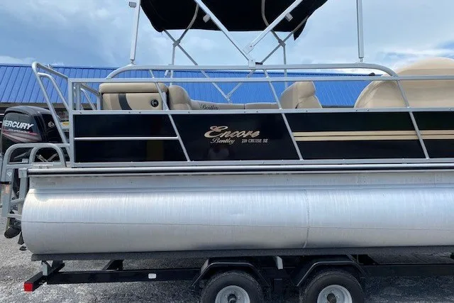 Slide: The Image of 2015 Bentley Pontoons 220 Cruise on trailer, featuring sleek design and comfortable seating. - 2