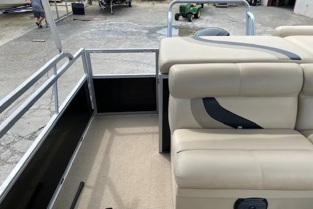 Slide: The Image of 2015 Bentley Pontoons 220 Cruise interior with beige seating and open deck area. - 11