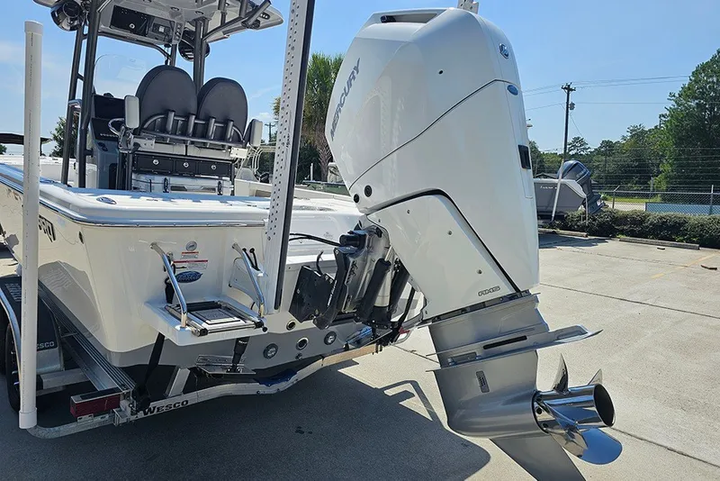 Slide: The Image of 2026 Sea Pro 250 Bay boat with powerful outboard motor on trailer. - 10