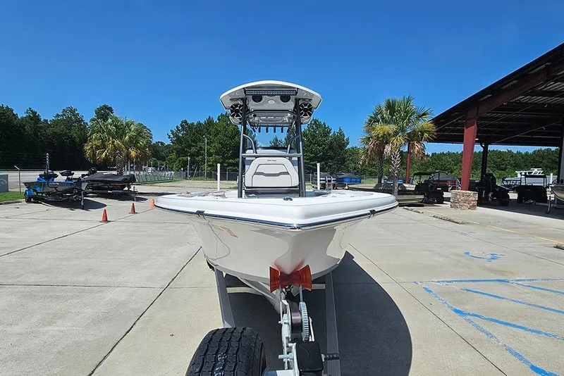 Slide: The Image of 2026 Sea Pro 250 Bay boat on trailer in sunny outdoor setting. - 4