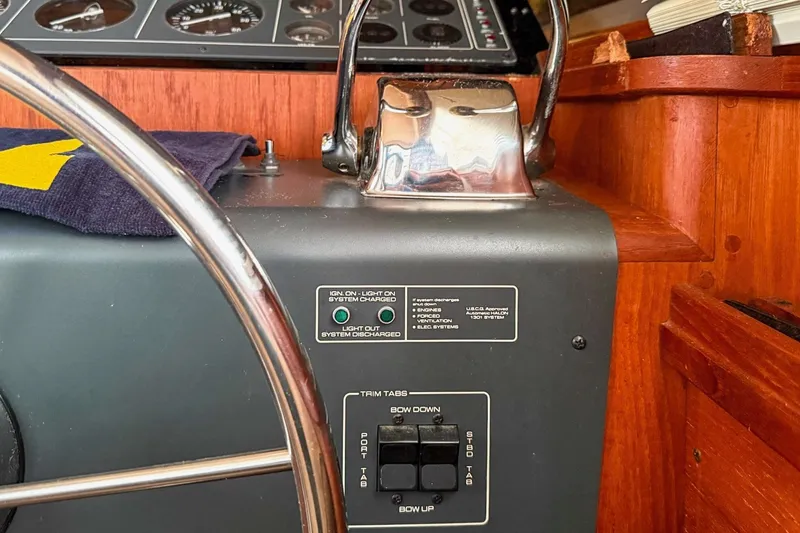 Slide: The Image of Close-up of 1989 Tiara Yachts 3600 Convertible helm controls and dashboard. - 27