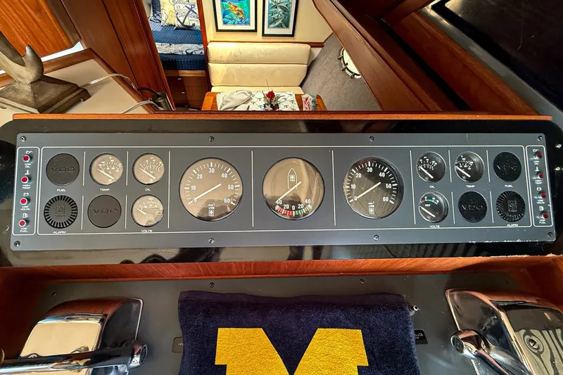 Slide: The Image of Dashboard of a 1989 Tiara Yachts 3600 Convertible with gauges and controls. - 25